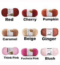 a variety of colors of yarn in different colors